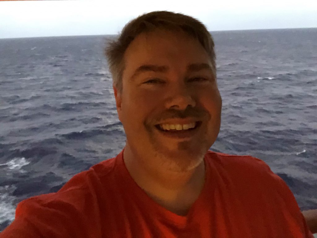 Happy man at the beach